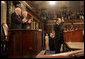 Prime Minister of Iraq Nouri al-Maliki responds to a welcome from Vice President Dick Cheney, House Speaker Dennis Hastert, and Congressional members before addressing a Joint Meeting of Congress, Wednesday, July 26, 2006, at the U.S. Capitol in Washington, D.C. Prime Minister Maliki, the first democratically elected prime minister of Iraq since the fall of Saddam Hussein, is on his first visit to Washington and met with President Bush yesterday to discuss the future development and security of Iraq. White House photo by David Bohrer