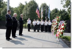 Vice President Dick Cheney stands with Secretary of the Interior Dirk Kempthorne, right, and South Korean Ambassador to the U.S. Tae Sik Lee, left, during a moment of silence after placing a wreath at the Korean War Memorial in Washington, D.C. to commemorate Korean War Veterans Armistice Day, Thursday, July 27, 2006. Today marks the 53rd anniversary of the end of the Korean War. White House photo by David Bohrer