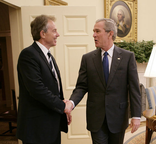 President George W. Bush welcomes Prime Minister Tony Blair of the United Kingdom back to the White House where the two leaders met for private discussions and later held a joint press availability Friday, July 28, 2006, in the East Room of the White House. White House photo by Eric Draper