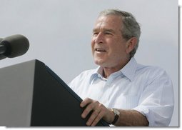 President George W. Bush discusses America's economy at the U.S. Coast Guard Integrated Support Command at the Port of Miami Monday, July 31, 2006. "It's an honor to be here at the largest container port in Florida and one of the most important ports in our nation," said President Bush.  White House photo by Kimberlee Hewitt