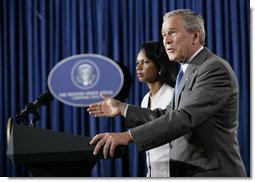 President George W. Bush is joined by Secretary of State Condoleezza Rice as he delivers a statement Monday, Aug. 7, 2006, on the Middle East crisis during a news conference in Crawford, Texas.  White House photo by Eric Draper