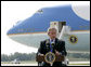 President George W. Bush addresses reporters upon his arrival to Austin Straubel International Airport in Green Bay, Wis., Thursday, Aug. 10, 2006 , on the airline bombing plot uncovered in the United Kingdom. President Bush said it is "a stark reminder that this nation is at war with Islamic fascists who will use any means to destroy those of us who love freedom, to hurt our nation." White House photo by Eric Draper