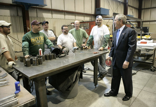 President George W. Bush praised small businesses in America as being vital to the economic growth of the country Thursday, Aug. 10, 2006, during his tour and visit with employees at Fox Valley Metal-Tech in Green Bay, Wis. White House photo by Eric Draper