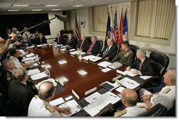 President George W. Bush talks with the press during a meeting with Vice President Dick Cheney, Defense Secretary Donald Rumsfeld and the Defense Policy and Programs Team at the Pentagon Monday, Aug. 14, 2006.  White House photo by Eric Draper