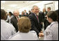 President George W. Bush and Vice President Dick Cheney meet military personnel at the Pentagon following their meeting with U.S. Secretary of Defense Donald Rumsfeld and the Defense Policy and Programs Team, Monday, Aug. 14, 2006, in Arlington, Va. White House photo by Eric Draper