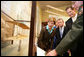 Mrs. Laura Bush, U.S. Senator Mike DeWine, and U.S. Rep. Mike Turner listen to National Park Superintendent Larry Blake as he shows them a model of the Wright Brothers airplane during a tour of the Dayton Aviation Heritage National Historical Park in the Wright-Dunbar Village, a Preserve America neighborhood, in Dayton, Ohio, Wednesday, August 16, 2006. Also shown is Fran DeWine, wife of Sen. Mike DeWine. White House photo by Shealah Craighead