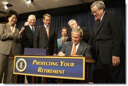 President George W. Bush signs into law H.R. 4, the Pension Protection Act of 2006, Thursday, Aug. 17, 2006. Joining him onstage in the Eisenhower Executive Office Building are, from left: Secretary of Labor Elaine Chao; Rep. Buck McKeon of California; Rep. John Boehner of Ohio; Senator Blanche Lincoln, D-Ark.; Senator Michael Enzi, R-Wyo., and Rep. Bill Thomas of California. Said the President, "Americans who spend a lifetime working hard should be confident that their pensions will be there when they retire." White House photo by Kimberlee Hewitt