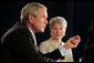 President George W. Bush addresses his remarks to an audience during his participation at a panel discussion Tuesday, Aug. 22, 2006, at the Minneapolis Marriott Southwest in Minnetonka, Minn., offering perspectives on efforts to enhance health care transparency and move towards a value-based health care competition. White House photo by Paul Morse