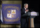 President George W. Bush addresses students, faculty and guests Tuesday, Aug. 29, 2006, at Warren Easton Senior High School in New Orleans on the importance of rebuilding schools and school libraries in hurricane ravaged communities, as the Gulf Coast region marked the one- year anniversary of Hurricane Katrina. White House photo by Eric Draper