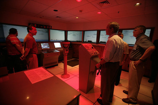 President George W. Bush drives a boat training simulator during a tour of the Paul Hall Center for Maritime Training and Education on Monday, September 4, 2006. White House photo by Kimberlee Hewitt