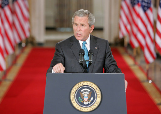 President George W. Bush emphasizes a point Wednesday Sept. 6, 2006 in the East Room of the White House, as he discusses the administration's draft legislation to create a strong and effective military commission to try suspected terrorists. The bill being sent to Congress, said President Bush, "reflects the reality that we are a nation at war, and that it is essential for us to use all reliable evidence to bring these people to justice." White House photo by Kimberlee Hewitt