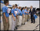 President George W. Bush congratulates members of the Columbus Northern Little League Team on winning the 2006 Little League Baseball World Series Championship at Dobbins Air Reserve Base in Marietta, Ga., Thursday, Sept. 7, 2006. White House photo by Eric Draper