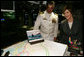 Mrs. Laura Bush and Captain John Litherland, Commanding Officer of the USS Texas, pause in the control room of the submarine during a tour of the ship Saturday, September 9, 2006, in Galveston, Texas. Mrs. Bush later participated in the Commissioning Ceremony marking the entry of the vessel into the U.S. Atlantic Fleet. White House photo by Shealah Craighead