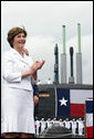 Mrs. Laura Bush, ship sponsor of the USS Texas, applauds at the conclusion of the Commissioning Ceremony Saturday, September 9, 2006, in Galveston, Texas. White House photo by Shealah Craighead