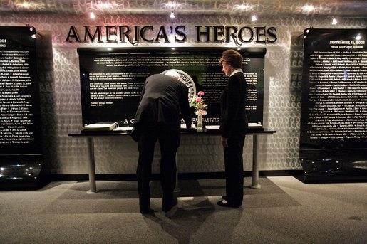 President George W. Bush and Laura Bush sign a guest book at the Pentagon in Arlington, Va., Monday, September 11, 2006, before participating in a ceremony marking the fifth anniversary of the September 11th attacks. White House photo by Eric Draper