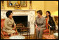 Mrs. Laura Bush talks with Mrs. Kwon Yang-Sook, wife of the President of South Korea, Thursday, September 14, 2006, during a coffee hosted by Mrs. Bush at the White House. White House photo by Shealah Craighead