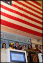 Mrs. Laura Bush raises the gavel signaling the close of trading Monday, Sept. 18, 2006, at the New York Stock Exchange. Mrs. Bush visited the Exchange to highlight literacy's role in extending benefits of free enterprise to individuals around the world. White House photo by Shealah Craighead