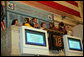 Mrs. Laura Bush is applauded as she stands over the New York Stock Exchange Monday, Sept. 18, 2006, where she visited to highlight literacy's role in extending the benefits of free enterprise to individuals around the world. White House photo by Shealah Craighead