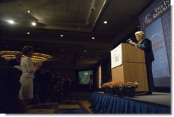 Mrs. Laura Bush applauds Ellen Johnson Sirleaf, President of Liberia, during the International Republican Institute's 2006 Freedom Award dinner Thursday, September 21, 2006, in Washington, D.C. IRI conducts a wide range of international programs to promote and strengthen democratic ideals and institutions. Mrs. Bush and President Sirleaf were presented the 2006 Freedom Award during the dinner. White House photo by Shealah Craighead