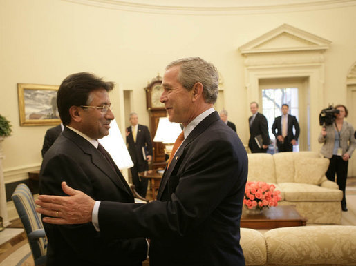 President George W. Bush welcomes His Excellency Pervez Musharraf, President of the Islamic Republic of Pakistan, to the Oval Office Friday, Sept. 22, 2006. The two discussed a number of issues, including earthquake recovery and continued intelligence cooperation. White House photo by Eric Draper