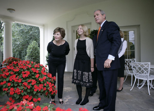 President George W. Bush and Mrs. Laura Bush are joined outside the Oval Office by the 2006 National Spelling Bee Champion, Kerry Close, as they call for Barney and Miss Beazley Friday, Sept. 22, 2006. The 9th grader from Spring Lake, N.J., won the competition by correctly spelling the word "Ursprache." White House photo by Eric Draper