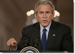 President George W. Bush offers remarks Tuesday, Sept. 26, 2006, during a joint press availability in the East Room with President Hamid Karzai, of the Islamic Republic of Afghanistan. Said the President, "The fighting in Afghanistan is part of a global struggle. Every victory in the war on terror enhances the security of free peoples everywhere." White House photo by Paul Morse