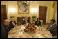 President George W. Bush sits with Vice President Dick Cheney and Secretary of State Condoleezza Rice as they host a working dinner Wednesday, Sept. 27, 2006, at the White House with President Hamid Karzai, left, of the Islamic Republic of Afghanistan, and President Pervez Musharraf, of the Islamic Republic of Pakistan. White House photo by Eric Draper