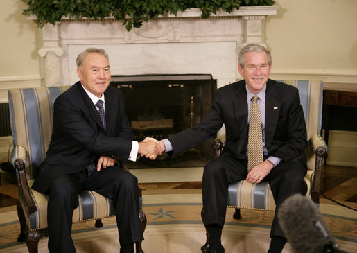 President George W. Bush and Kazakhstan President Nursultan Nazarbayev shake hands during their meeting Friday, Sept. 29, 2006 in the Oval Office at the White House. White House photo by Eric Draper