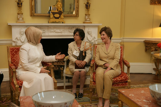 Mrs. Laura Bush visits with Mrs. Emine Erdogan, wife of Prime Minister Recep Tayyip Erdogan of Turkey , in the Yellow Oval Room in the private residence of the White House Monday, October 2, 2006. White House photo by Shealah Craighead