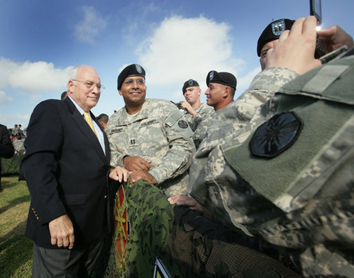 Vice President Dick Cheney pauses for a photo with a soldier at Fort Hood, Texas after delivering remarks at a rally for the troops, Wednesday, October 4, 2006. White House photo by David Bohrer