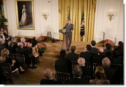 President George W. Bush welcomes invited guests Friday, Oct. 6, 2006 to the East Room of the White House, as part the festivities in celebration of National Hispanic Heritage Month. White House photo by Kimberlee Hewitt