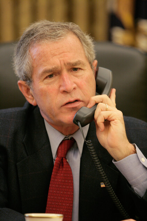 President George W. Bush speaks with Chinese President Hu Jintao from the Oval Office, Monday, Oct. 9, 2006. White House photo by Eric Draper