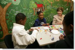 Mrs. Laura Bush sculpts clay with participants of the Communications Through Art program at the Knox County Public Defenders Community Law Office in Knoxville, Tennessee, Wednesday, October 11, 2006, as part of the President’s Helping America’s Youth program. Communications Through Art program uses the arts to help young people express themselves and to deal with important issues of the day. White House photo by Shealah Craighead