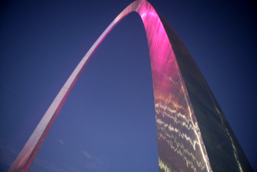 The Gateway Arch in St. Louis was illuminated in pink in honor of Breast Cancer Awareness Month during the Arch Lighting for Breast Cancer Awareness Thursday, Oct. 12, 2006. Mrs. Laura Bush delivered remarks and met with the audience members during the event. White House photo by Shealah Craighead