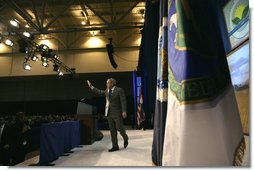 President George W. Bush waves as he leaves the stage following his keynote address at the 2006 Advancing Renewable Energy: An American Rural Renaissance Conference, Thursday, Oct. 12, 2006, at the St. Louis Convention Center in St. Louis, Mo. President Bush discussed the development of new energy sources that reduce America's consumption of oil, such as hydrogen, ethanol and biodiesel. White House photo by Eric Draper