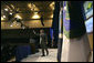 President George W. Bush waves as he leaves the stage following his keynote address at the 2006 Advancing Renewable Energy: An American Rural Renaissance Conference, Thursday, Oct. 12, 2006, at the St. Louis Convention Center in St. Louis, Mo. President Bush discussed the development of new energy sources that reduce America's consumption of oil, such as hydrogen, ethanol and biodiesel. White House photo by Eric Draper