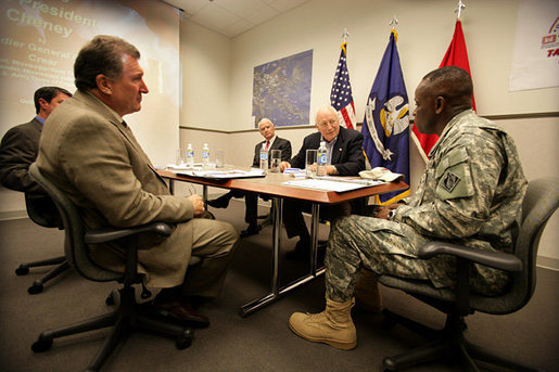 Vice President Dick Cheney speaks with Brigadier General Robert Crear, Commander of the Mississippi Valley Division of the U.S. Army Corps of Engineers, during a briefing on Hurricane Katrina recovery held at the New Orleans Port Authority in New Orleans, La., Thursday, October 12, 2006. The U.S. Army Corps of Engineers has been working to address flood problems along the Mississippi River since the 1800's and is responsible for rebuilding the 169 miles of levees in the southeast Louisiana area that sustained damage as a result of Katrina. White House photo by David Bohrer