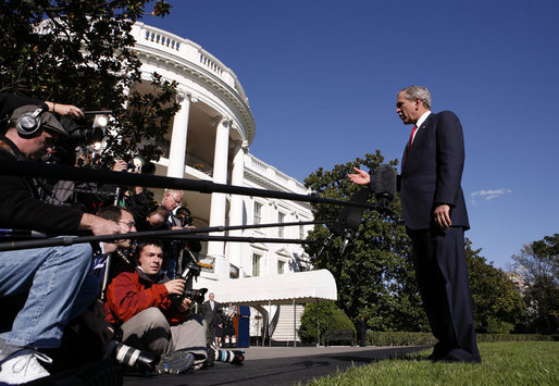 President George W. Bush comments on the passing of a resolution by the United Nations concerning the actions of North Korea before departing the White House on October 14, 2006. White House photo by Paul Morse