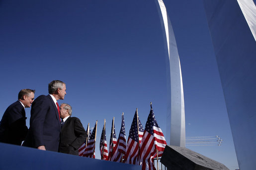 President George W. Bush observes the Air Force Thunderbirds performing at the dedication of the United States Air Force Memorial in Arlington, Virginia on October 14, 2006. White House photo by Paul Morse