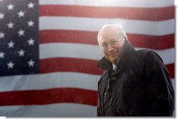 Vice President Dick Cheney stands in a steady rain during a rally at Fort Campbell Army Base in Fort Campbell, Ky., Monday, October 16, 2006. The Vice President visited Fort Campbell to welcome home over 4,000 troops from the 101st Airborne Division who returned in September from a tour of duty in Iraq. White House photo by David Bohrer