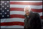 Vice President Dick Cheney stands in a steady rain during a rally at Fort Campbell Army Base in Fort Campbell, Ky., Monday, October 16, 2006. The Vice President visited Fort Campbell to welcome home over 4,000 troops from the 101st Airborne Division who returned in September from a tour of duty in Iraq. White House photo by David Bohrer