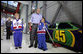 President George W. Bush gets a close-up view of the 45 car Wednesday, Oct. 18, 2006, at Victory Junction Gang Camp, Inc. with Will "Cheese" Kwapil, 12, left, who suffers from a congenital heart defect, and Pauly Rader, 9, who has a brain tumor. The camp, founded by Kyle and Pattie Petty, serves children primarily from North Carolina, South Carolina and Virginia with chronic medical conditions or serious illnesses. White House photo by Paul Morse