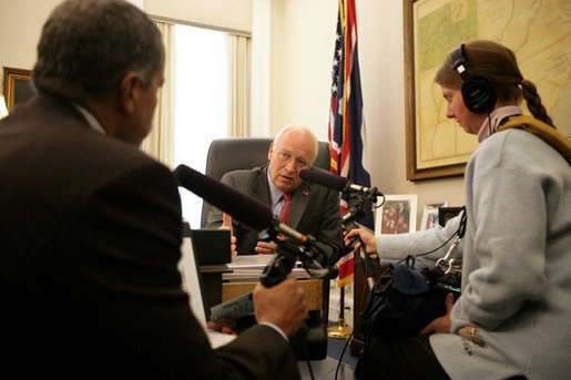 Vice President Dick Cheney talks with Juan Williams, left, of National Public Radio during a taped radio interview in the Vice President's office during the White House Radio Day, Tuesday, October 24, 2006. White House photo by David Bohrer