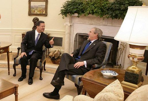 President George W. Bush meets with President Leonel Fernandez of the Dominican Republic in the Oval Office Wednesday, Oct. 25, 2006. White House photo by Eric Draper