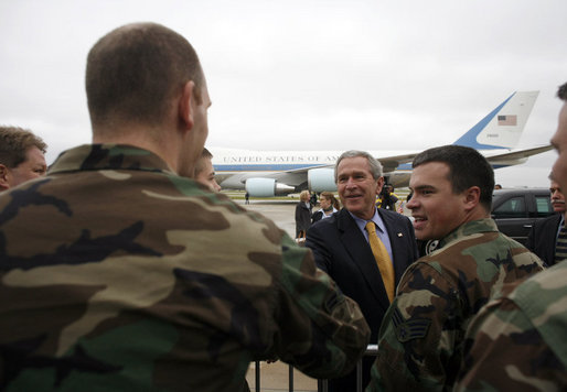 President George W. Bush greets military personnel and families Thursday, Oct. 26, 2006, before departing Des Moines International Airport in Des Moines, Iowa. White House photo by Paul Morse