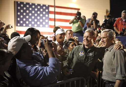 President George W. Bush poses for photos prior to his departure Tuesday, Oct. 31, 2006, at Robins Air Force Base in Warner Robins, Ga. White House photo by Paul Morse