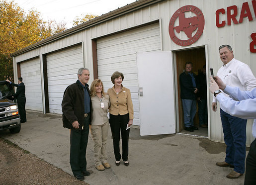 President George W. Bush and Laura Bush greet fellow voters after casting their ballots at the Crawford Fire Station in Crawford, Texas, Tuesday, Nov. 7, 2006. White House photo by Eric Draper