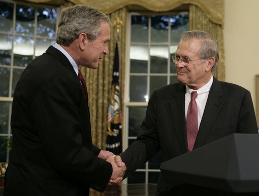 President George W. Bush shakes the hand of outgoing Secretary of Defense Donald Rumsfeld Wednesday, Nov. 8, 2006, in the Oval Office where the President announced the Secretary's resignation and his intention to nominate Dr. Robert Gates as successor. White House photo by Paul Morse