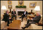 President George W. Bush and Vice President Dick Cheney speak with Senate Democratic leaders Sen. Harry Reid, second from left, and Sen. Richard Durbin at a post-election meeting in the Oval Office, Friday, Nov.10, 2006. White House photo by David Bohrer