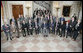 President George W. Bush and Mrs. Laura Bush stand with members of the 555th Anti-aircraft Artillary (Automatic Weapons) Battalion (555 AAA Battalion) at the White House Veteran's Day reception Saturday, Nov. 11, 2006. Mrs Bush's father, Harold B. Welch, served as Battalion Master Gunner in the "Five-by-Five." Two survivors from the Nazi concentration camp Nordhausen were also in attendance at the reception. The 555 AAA Battalion was attached to the 104th Infantry Division, which liberated the Nazi concentration camp Nordhausen on April 12, 1945. White House photo by Kimberlee Hewitt